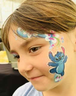 Stitch facepainting on a girl in Telford